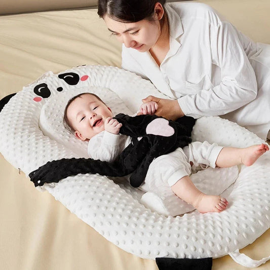 reducteur_de_lit_bebe