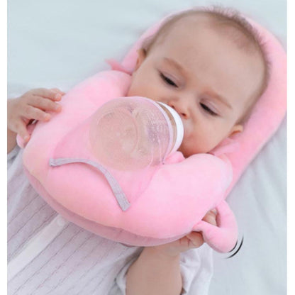 Détail du coussin biberon BibSupport™ rose - Design ergonomique et matière douce 100% coton pour bébé"