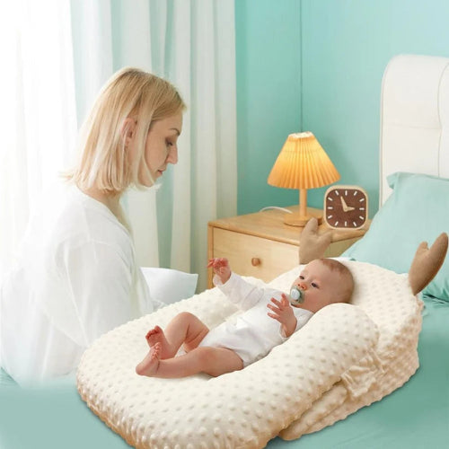 cocon bebe | reducteur de lit cerf  royaumedebebeetmaman.com.com