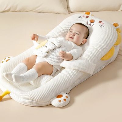 Reducteur de lit bebe  royaumedebebeetmaman.com.com