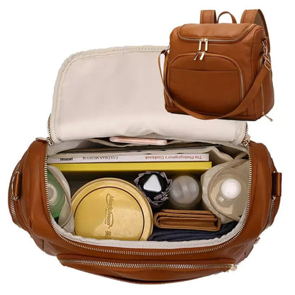 SAC A DOS A LANGER BEBE EN CUIR  royaumedebebeetmaman.com.com